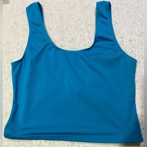 Shape & slim 
By Newport News tank top size 14 
( Large) color blue 
Pre-owned